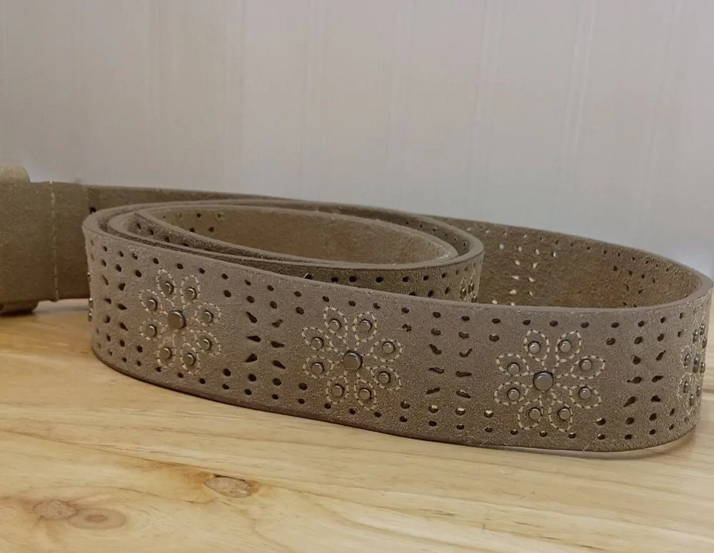 Beige ornate leather like belt. 45 in